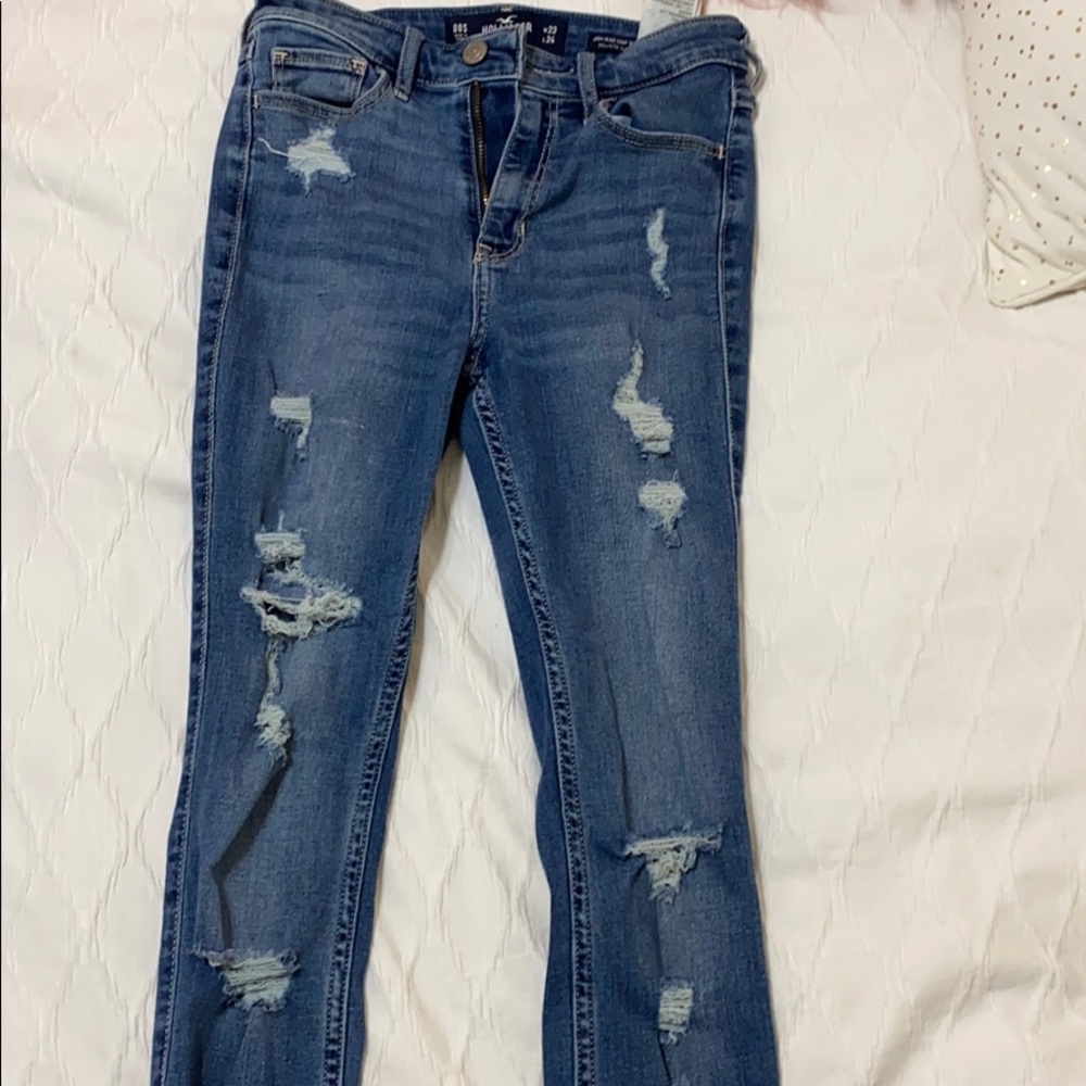 Ripped blue high rise jeans
